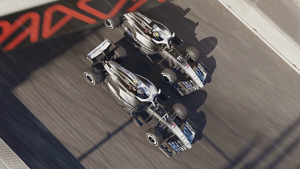 F1 25 screenshot: Two racing cars speed down a track side by side, showcasing intense competition and dynamic motion.
