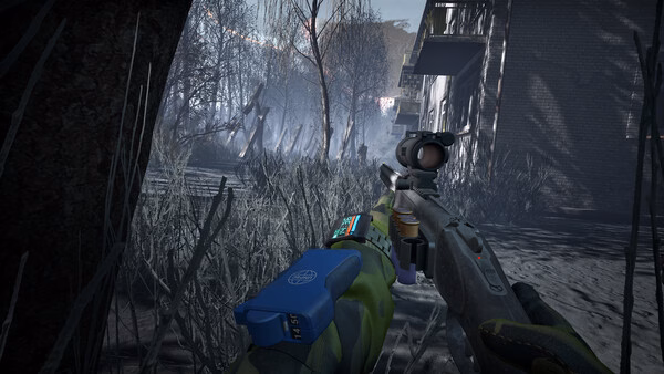 Into the Radius 2 screenshot: A player holds a scoped rifle, aiming through a foggy, desolate landscape with bare trees and a building.